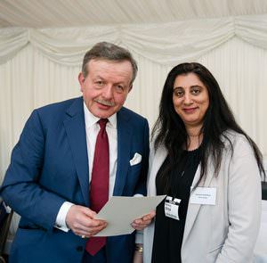 Collecting the award from Lord Lexden